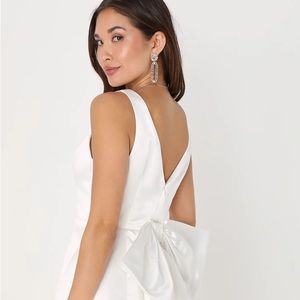 White dress with bow on back